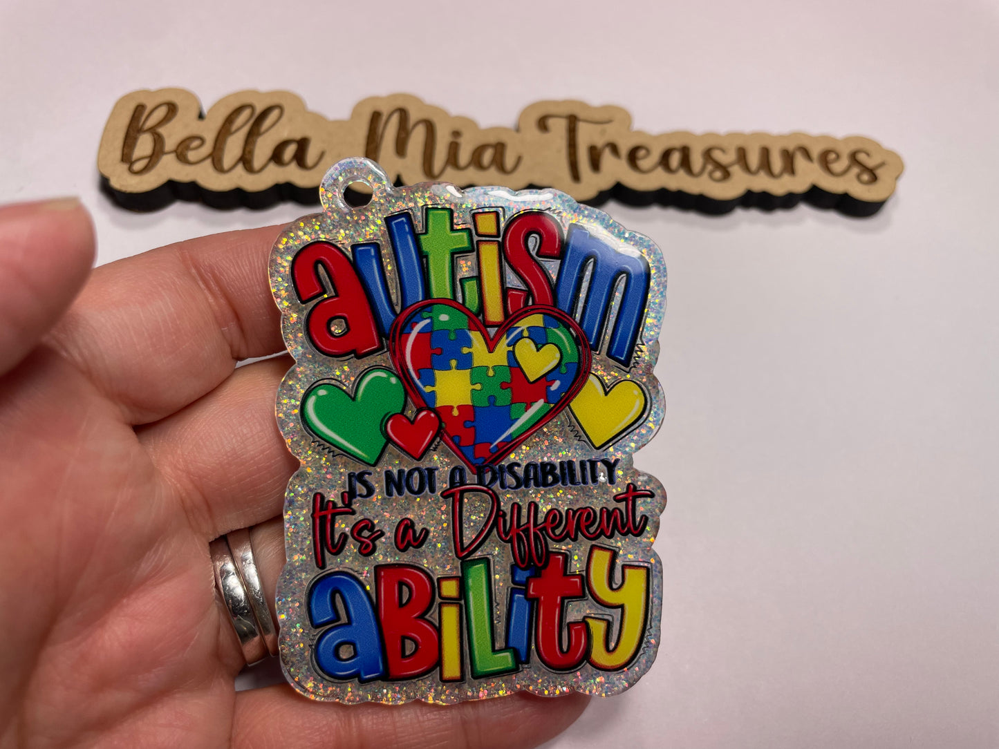 Autism is not a disability it's a different ability keychain
