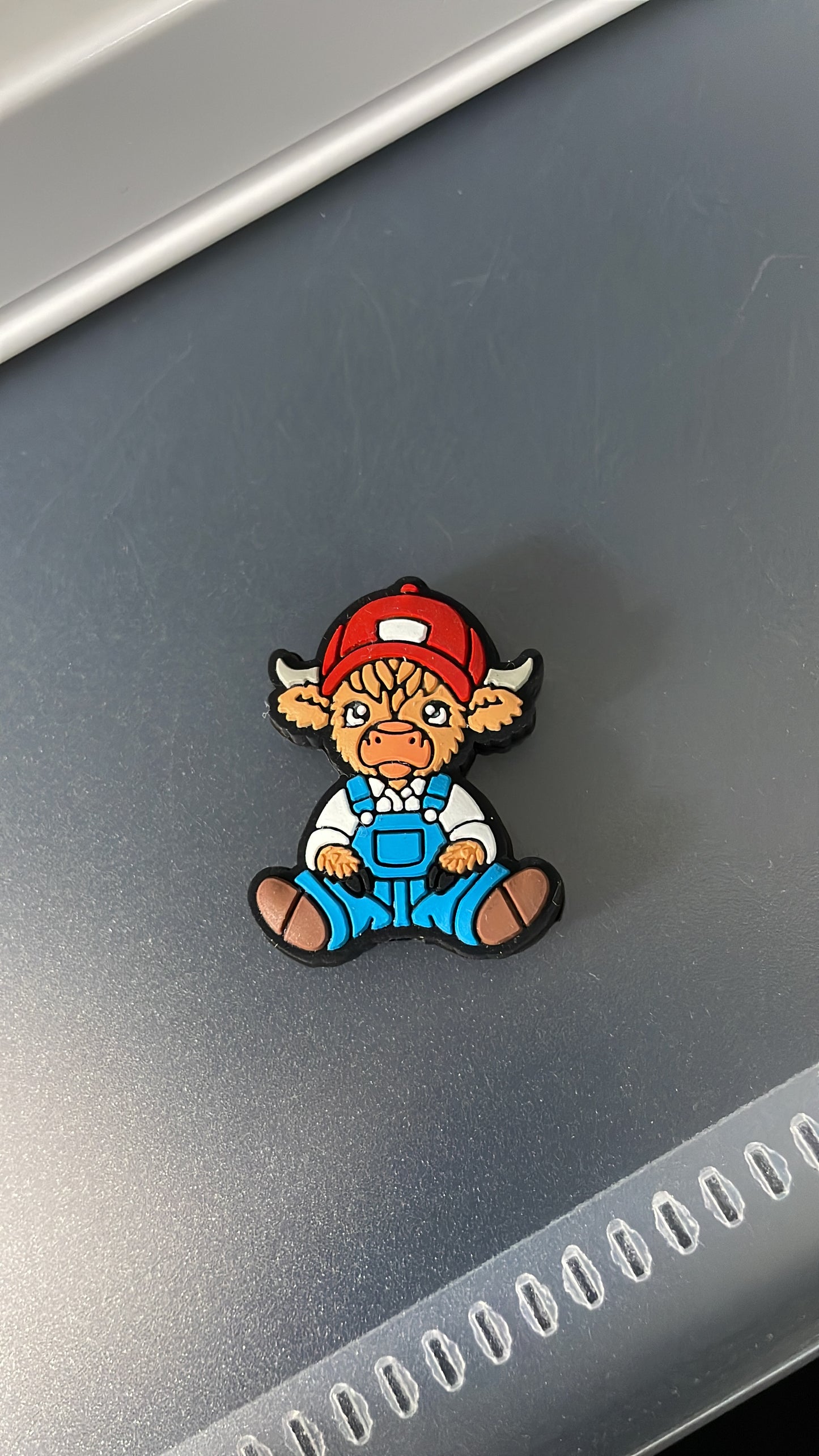 Cow in red hat