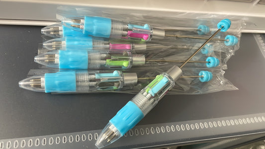 Multi color pen in light blue